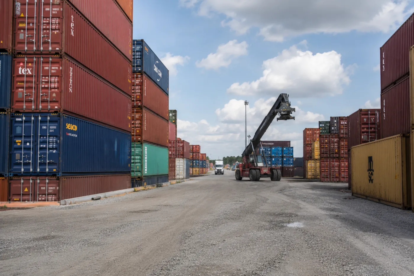 OnTrak gated, monitored container yard staging loaded and empty containers and chassis in Florida
